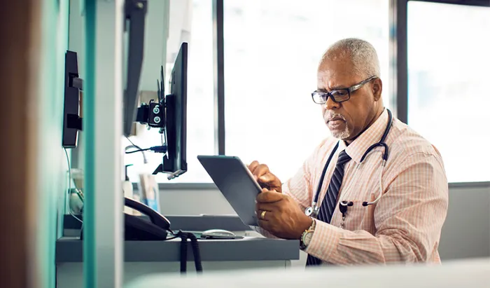 doctor looking at screen