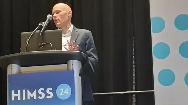 Geoffrey Roche, director of workforce development at Siemens Healthineers, speaks at HIMSS24 in Orlando Monday.