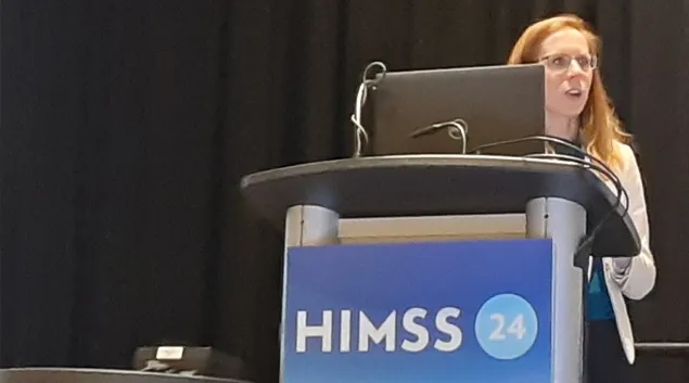 Sarah Rauzin, associate director at Health Action Alliance, speaks at HIMSS24 in Orlando Monday.