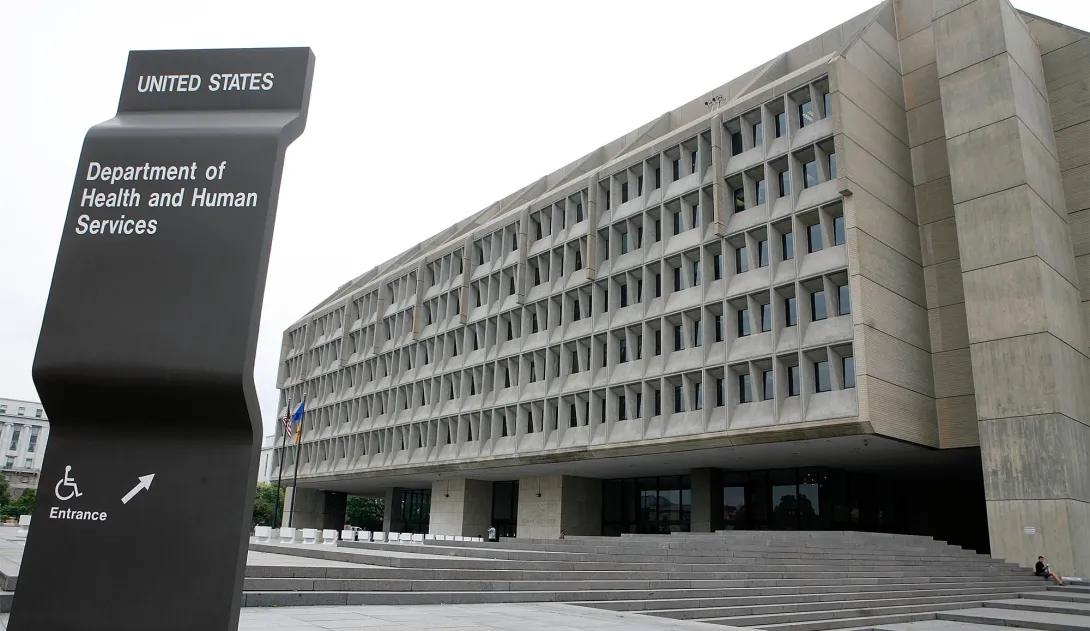 HHS Building with sign in front