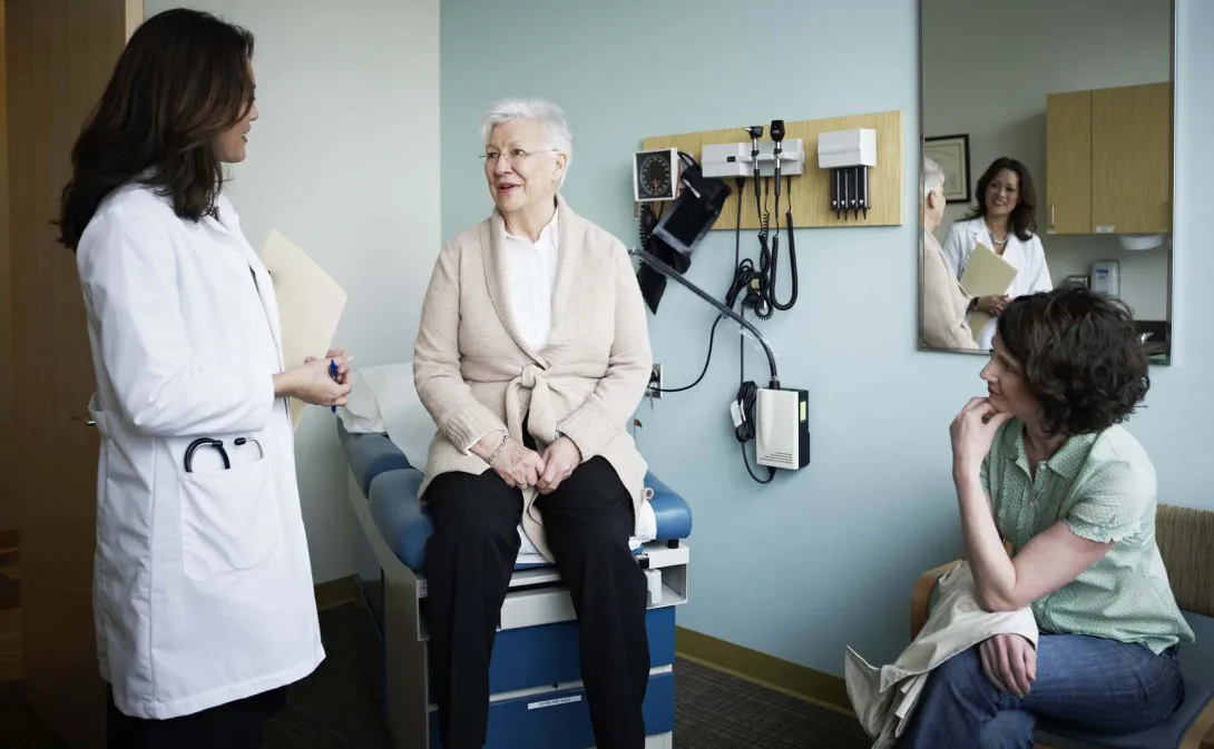 Senior patient with doctor