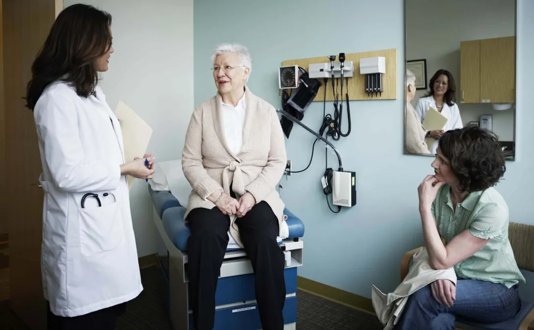 Senior patient with doctor