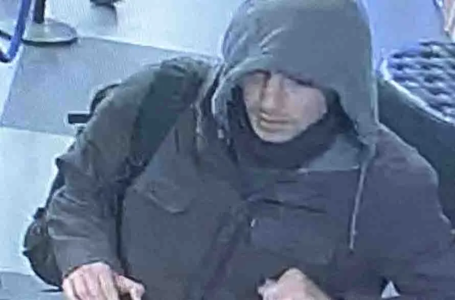 The suspected shooter seen in a surveillance video from the hostel where he was staying