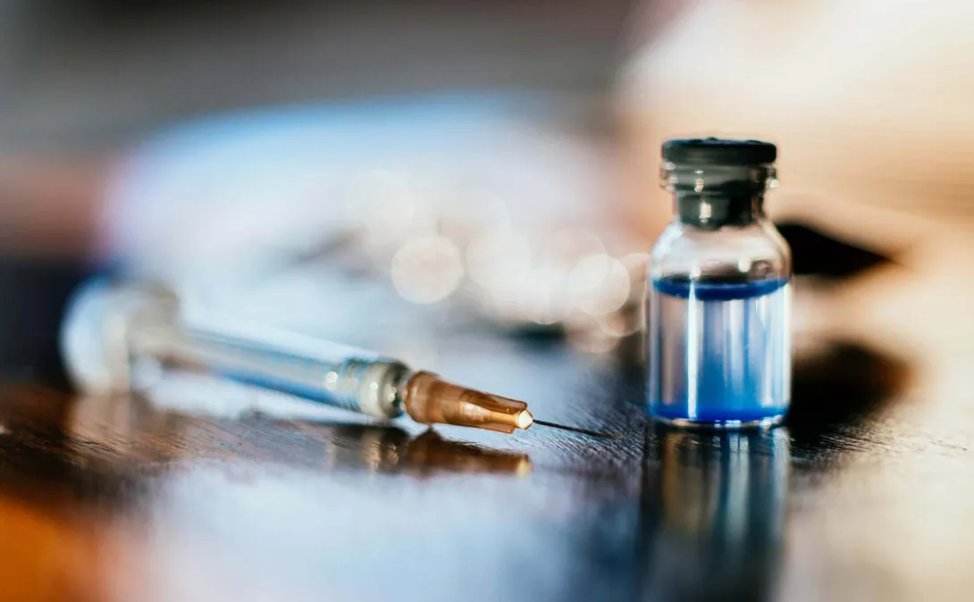 Syringe and bottle