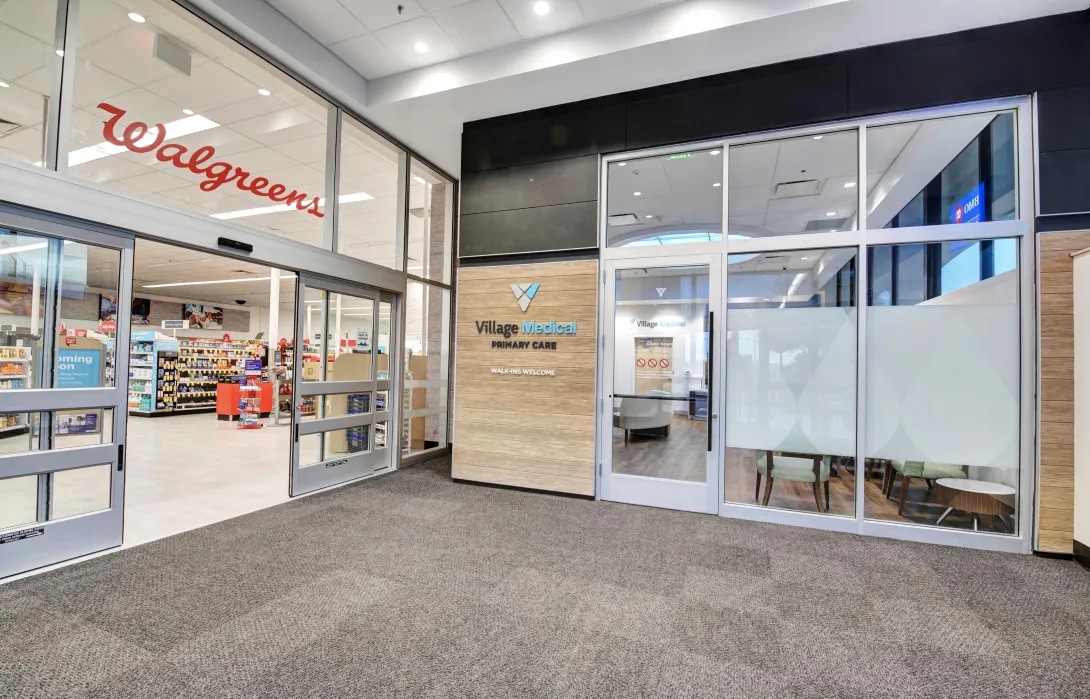 Walgreens with an adjacent VillageMD
