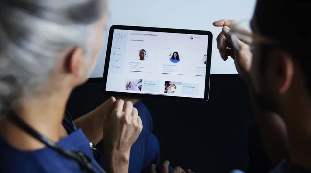 Doctor and patient with tablet