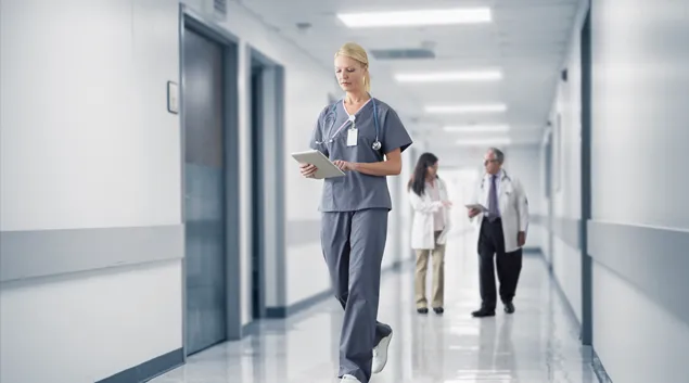 People in hospital hallway