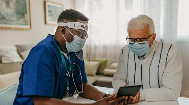 A home medical visit with a tablet
