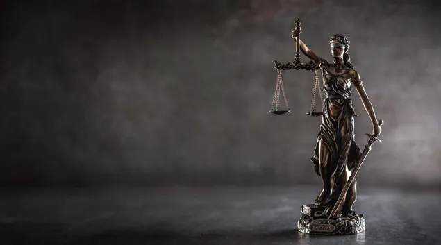 Figurine of Justice holding scales