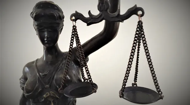Statue of Justice holding scales