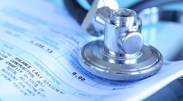 Stethoscope resting on papers