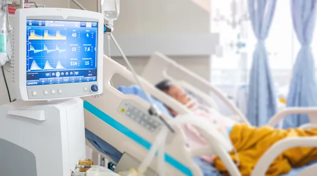 Patient in hospital bed