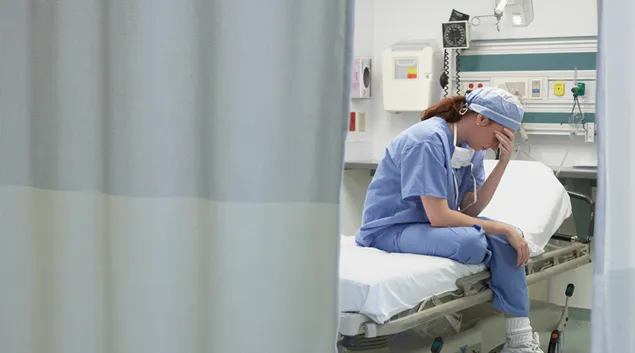 Medical professional looking unhappy