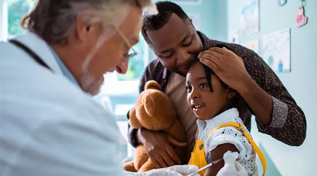Child receiving vaccine