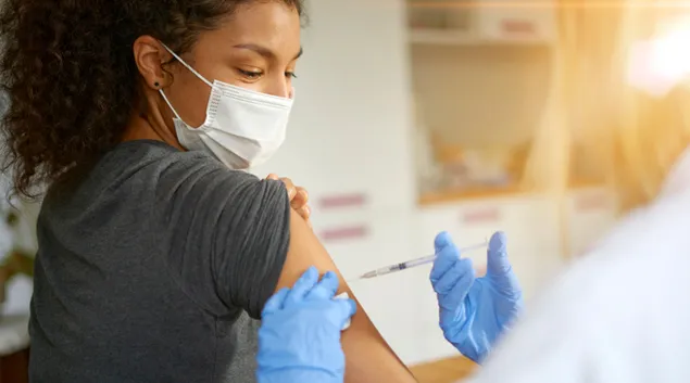 A vaccine being administered